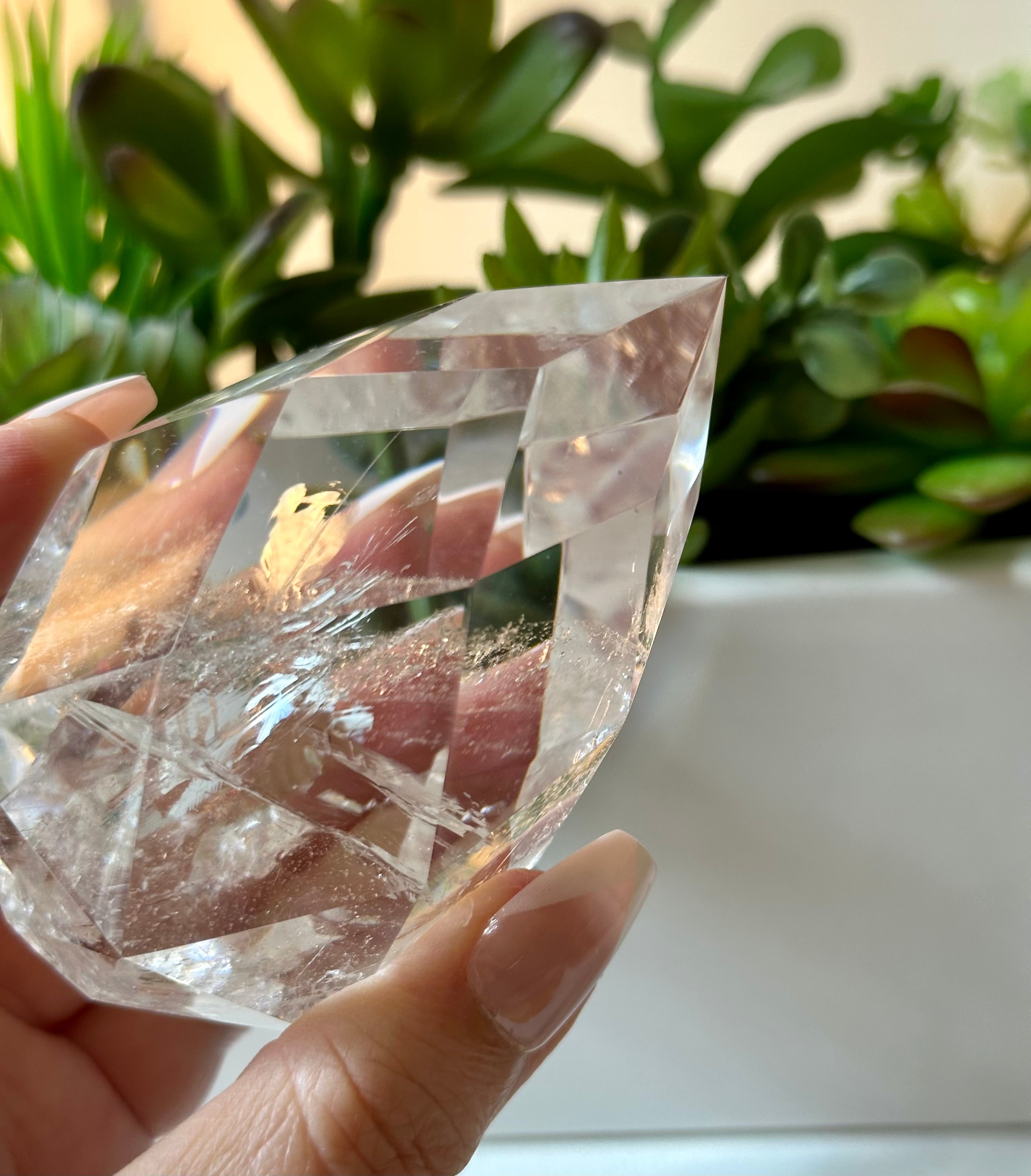 clear quartz crystal with iridescent rainbows