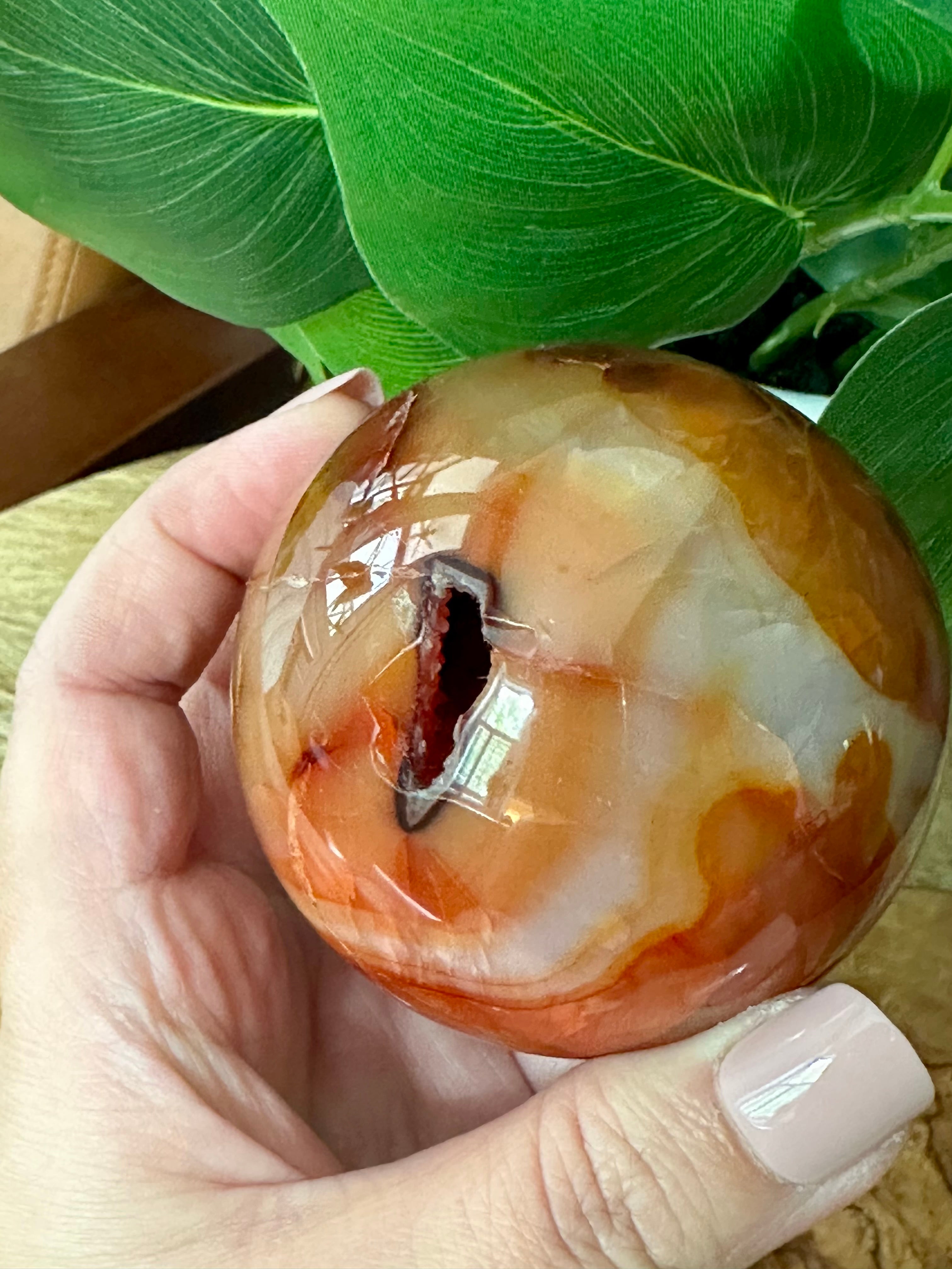 Carnelian Sphere with natural Druzy inclusion. 70mm.