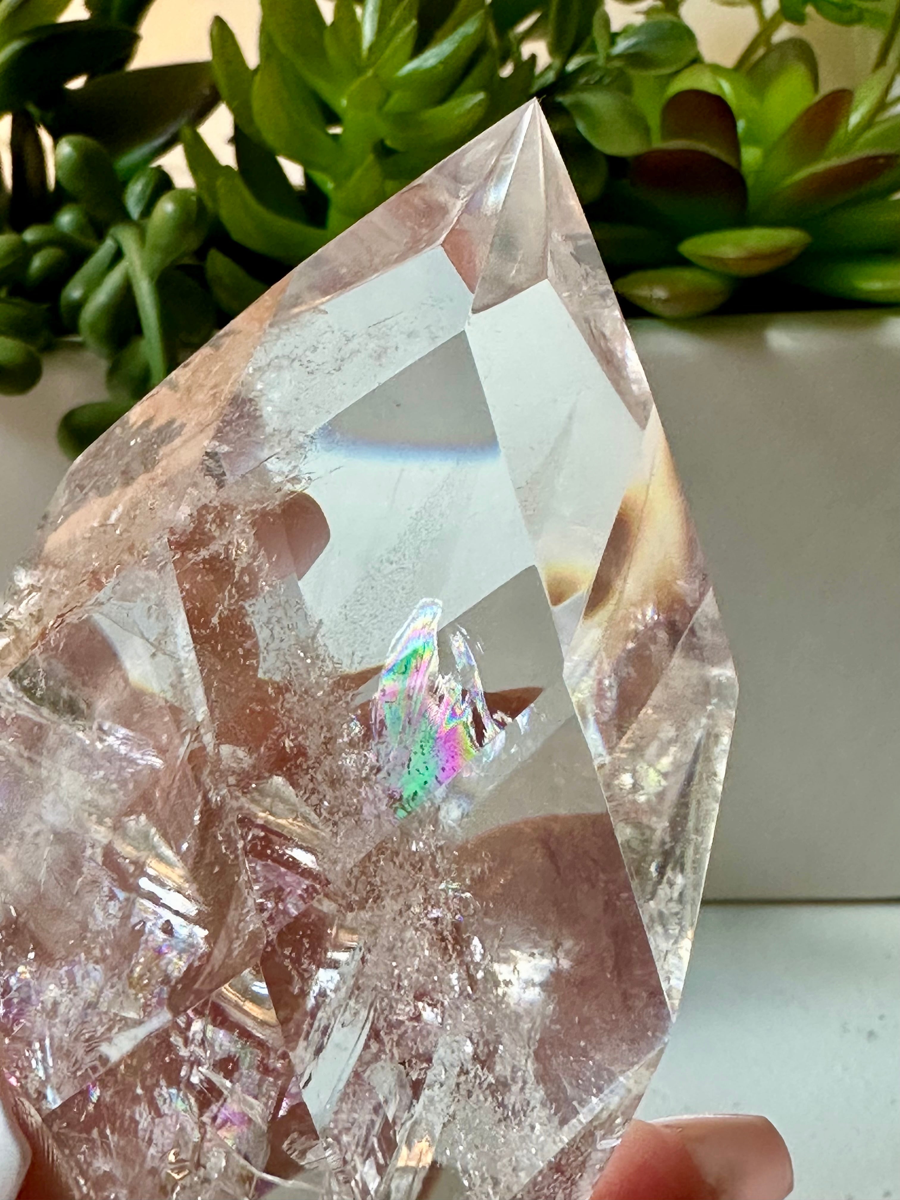 clear quartz crystal with iridescent rainbows