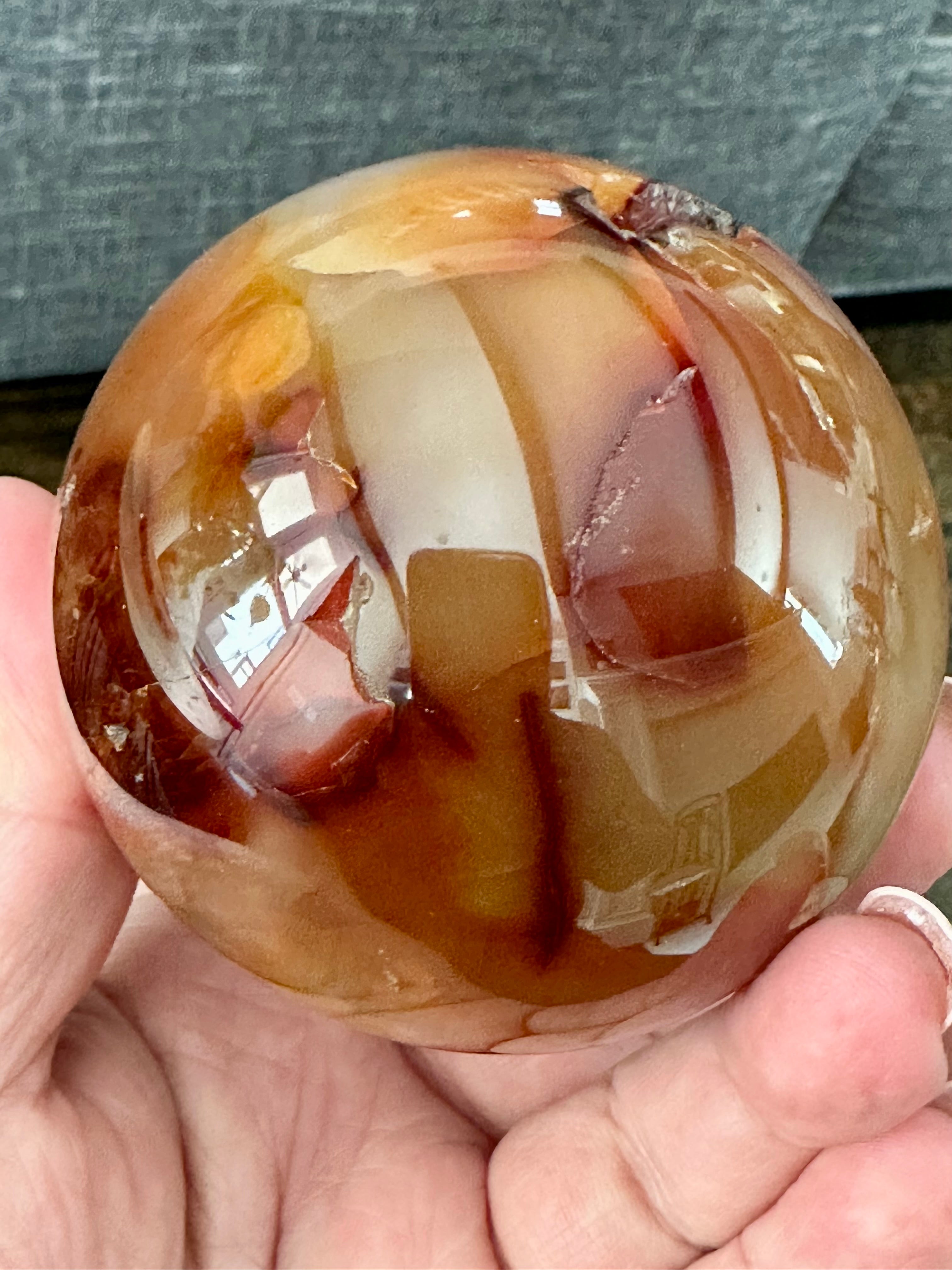 Carnelian Sphere with natural Druzy inclusion. 70mm.