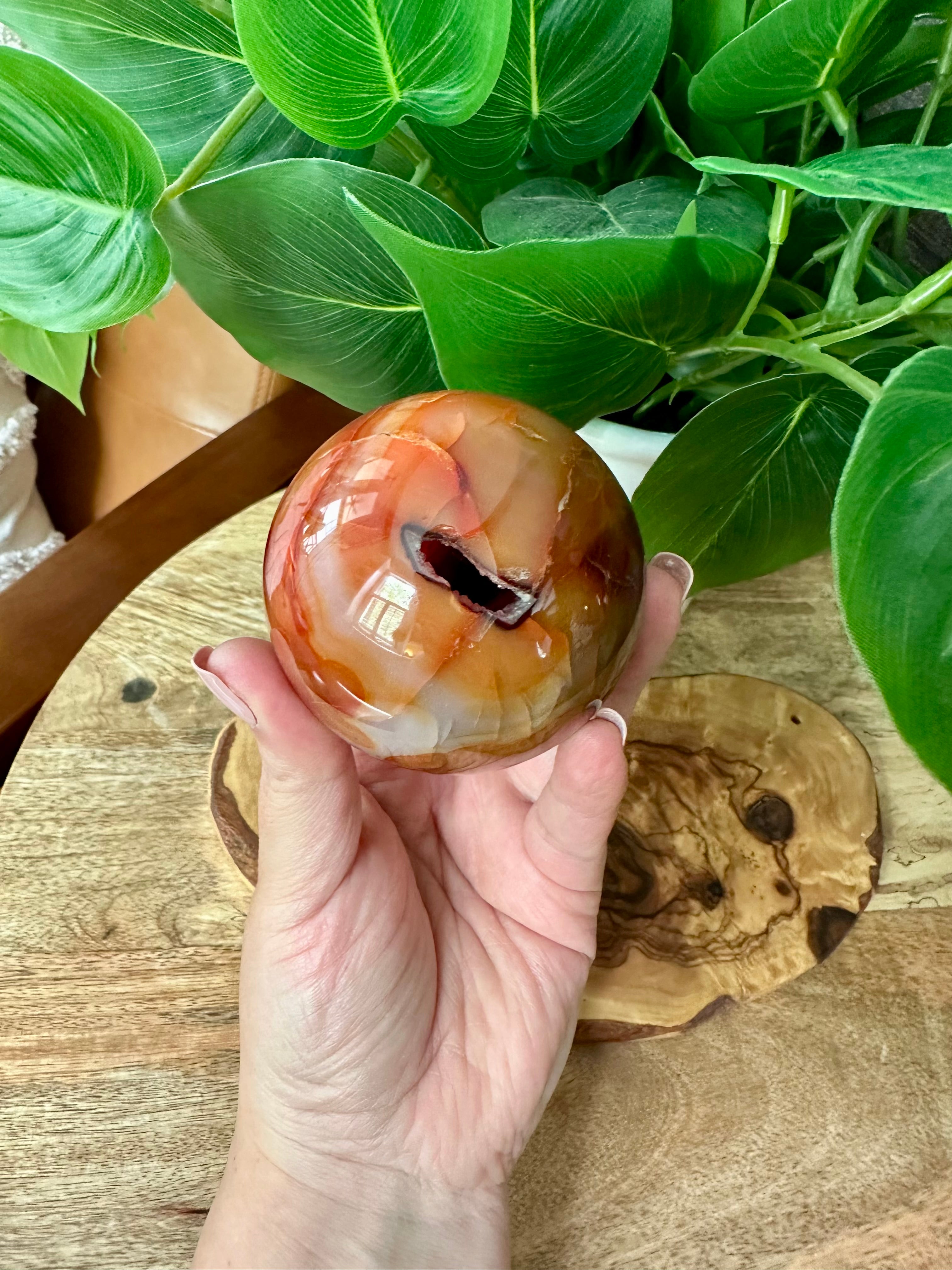 Carnelian Sphere with natural Druzy inclusion. 70mm.