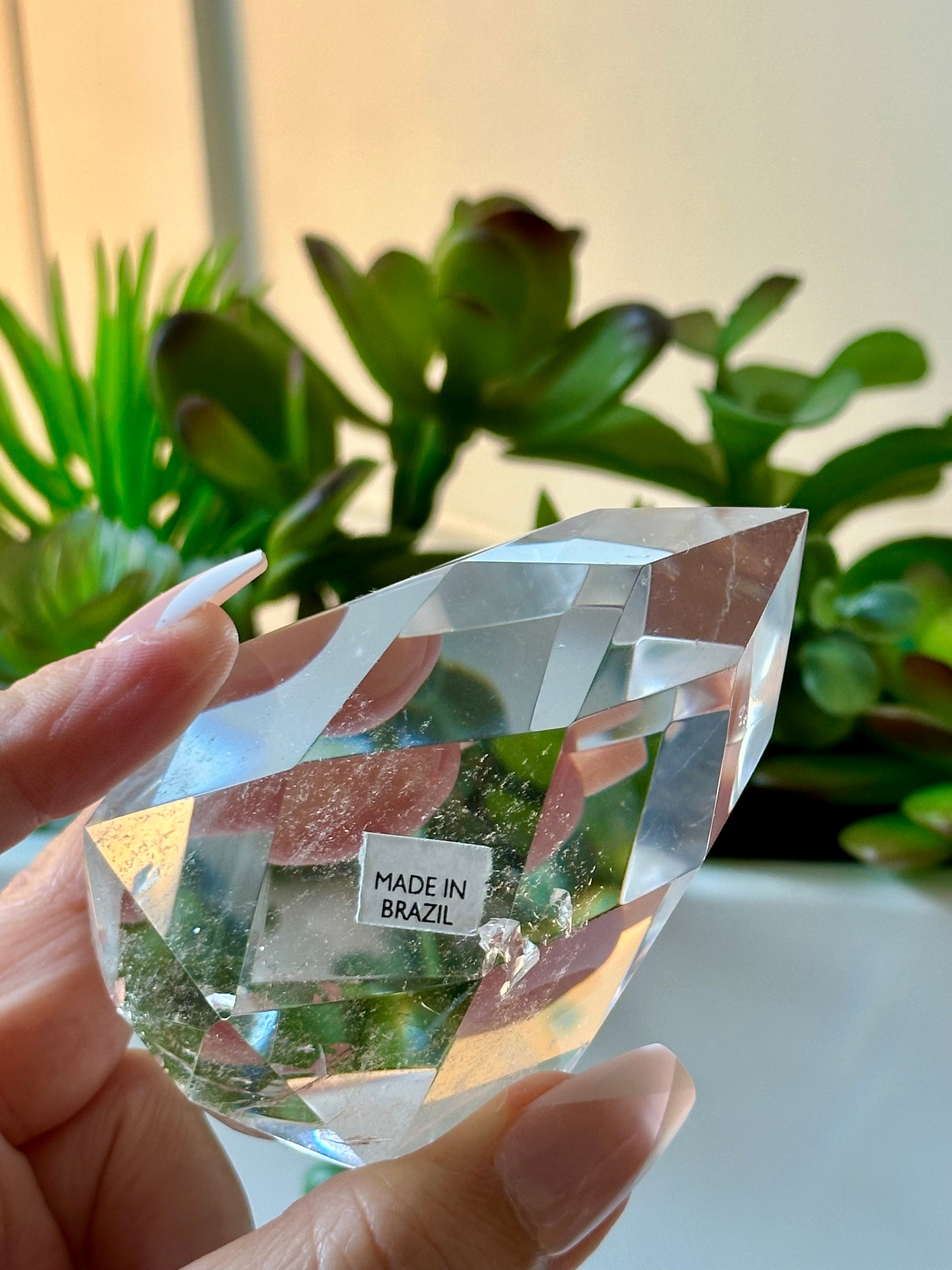Clear quartz crystal multifaceted polished flame