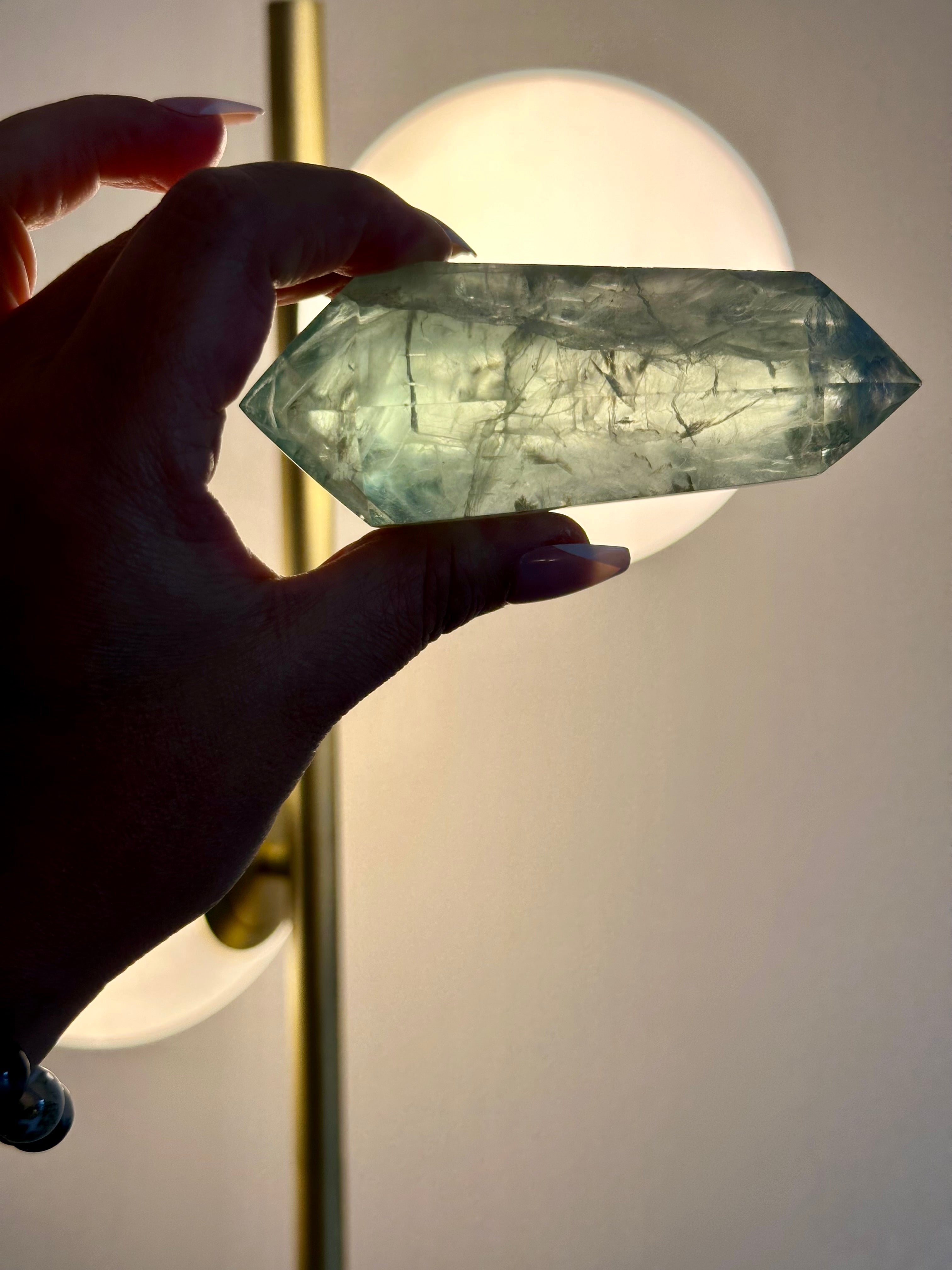 Fluorite Double Terminated Point with Custom stand. 256 gr.