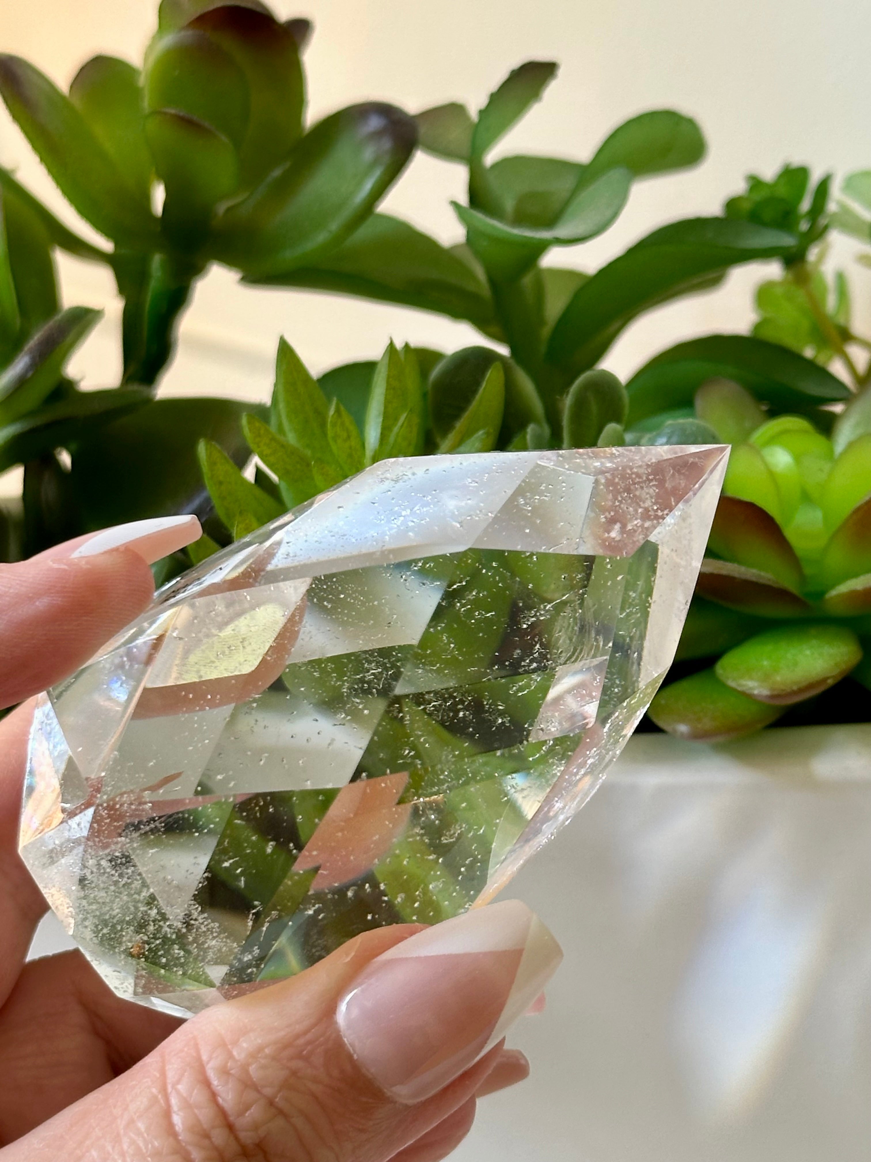 Medium High Clarity Multifaceted Quartz Flame. 198 gr.