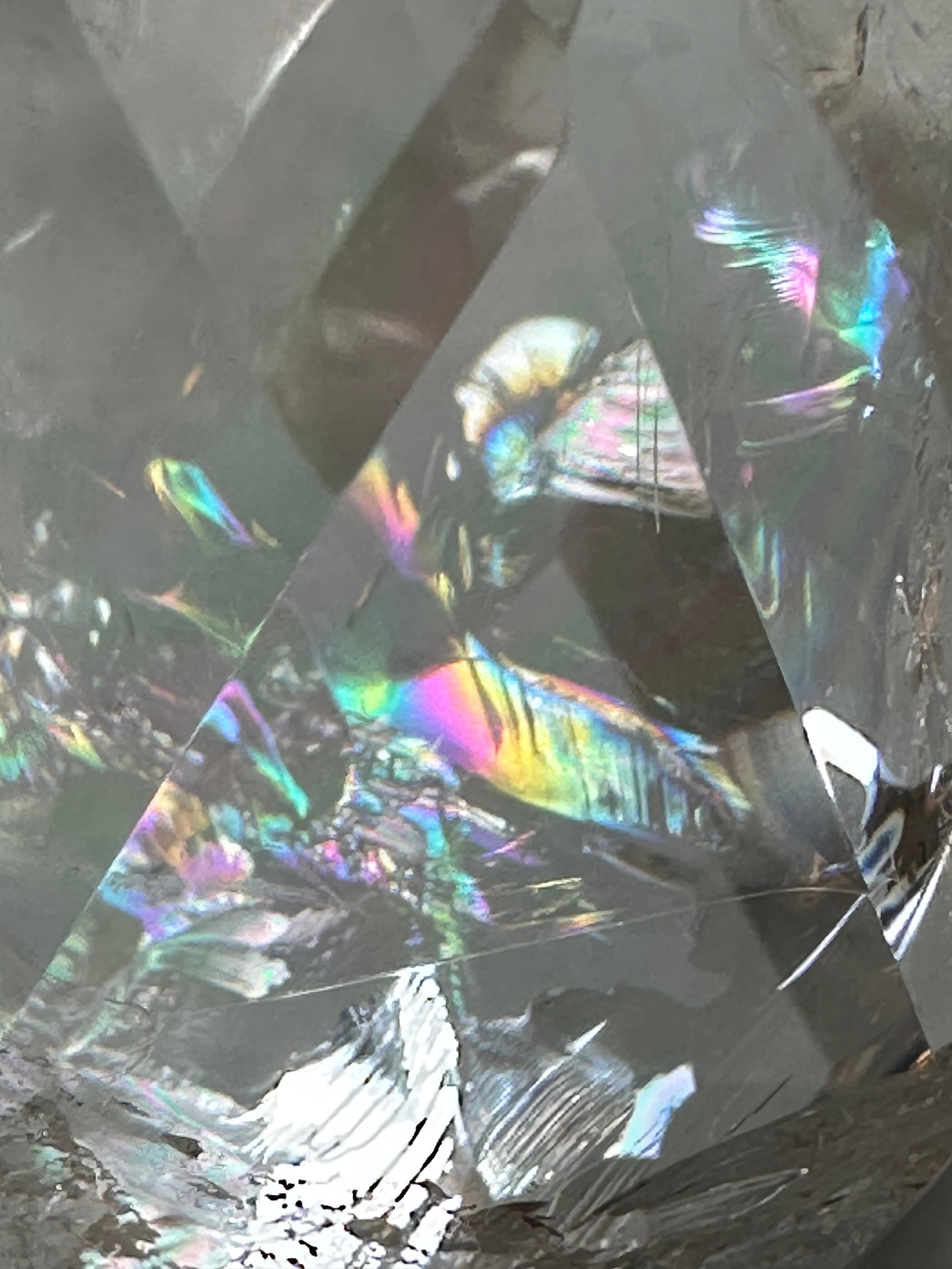 Close-up of a crystal with rainbow
