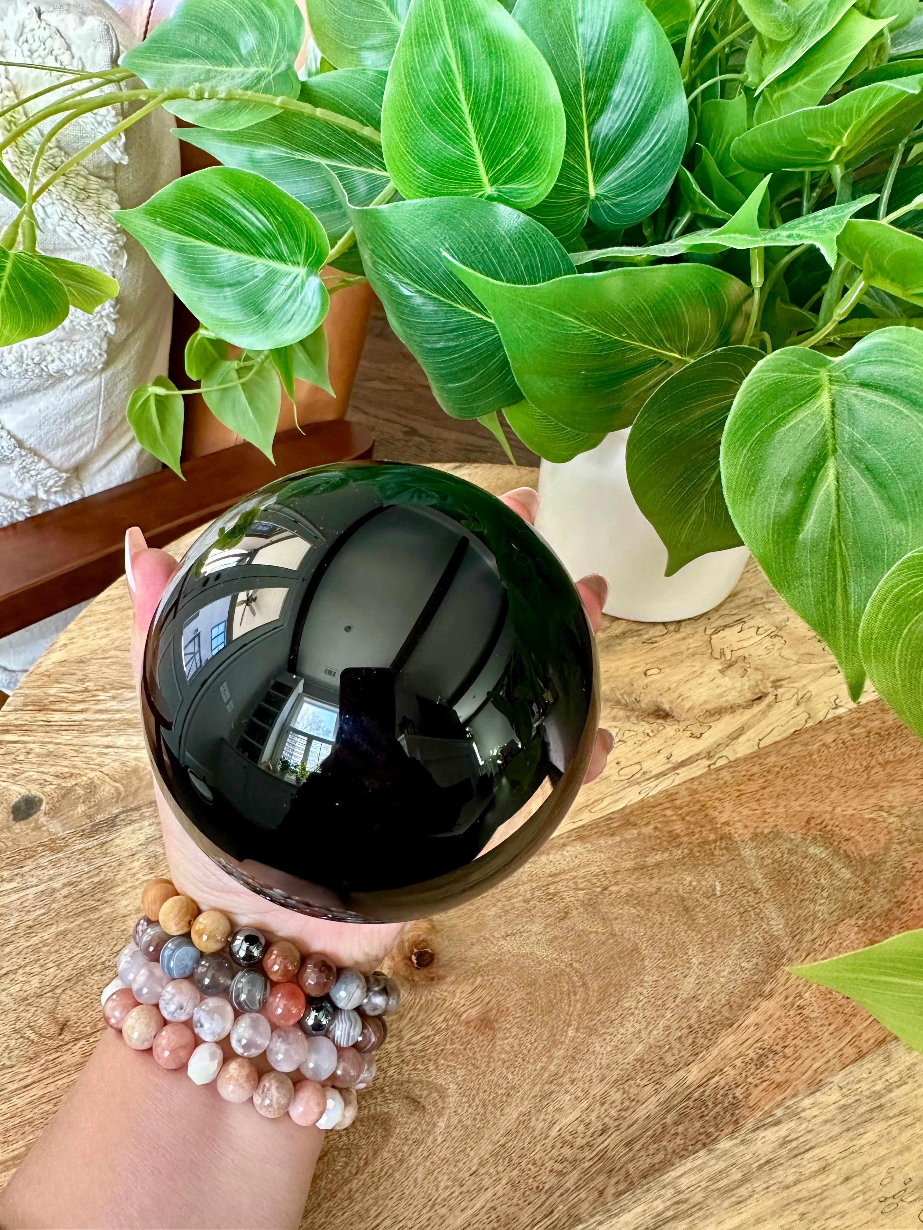 XL Black Obsidian Sphere. 103mm. 3.7lbs Natural Black Obsidian polished sphere from Madagascar.