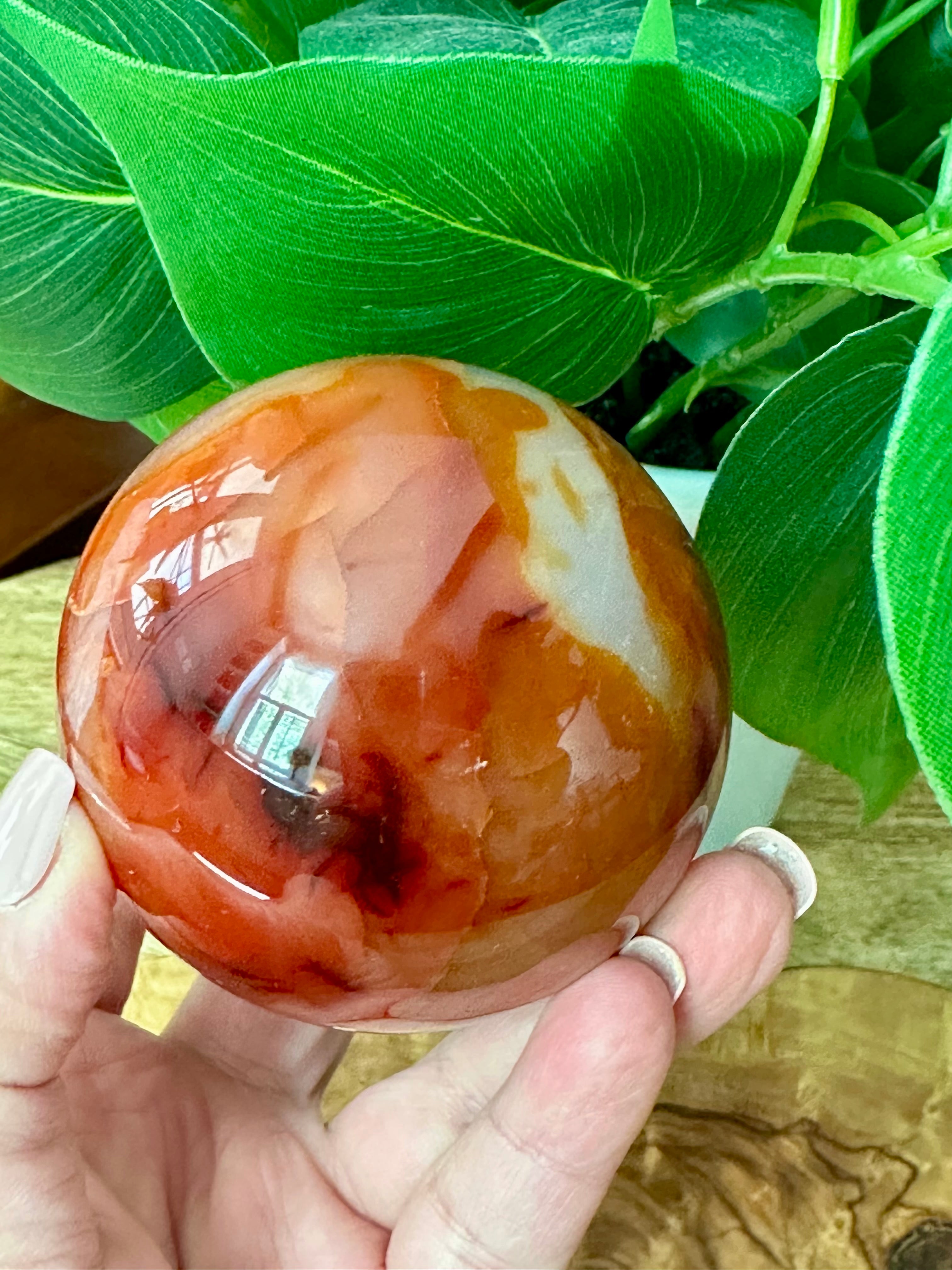 Carnelian Sphere with natural Druzy inclusion. 70mm.