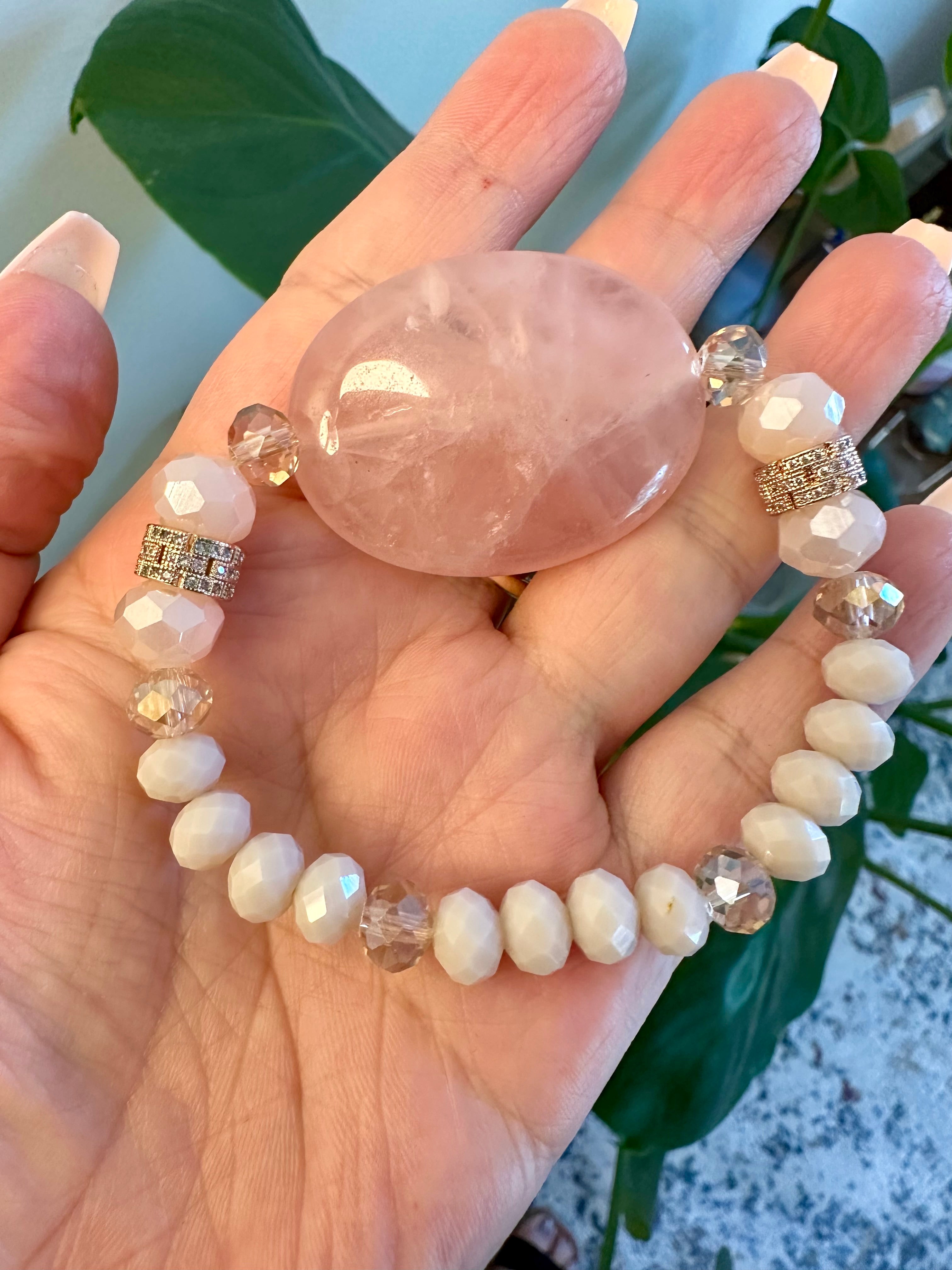 Rose quartz femine energy themed bracelet with large oblong Rose quartz gemstone.