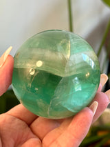 Gorgeous Emerald Green Fluorite Sphere. 65mm.