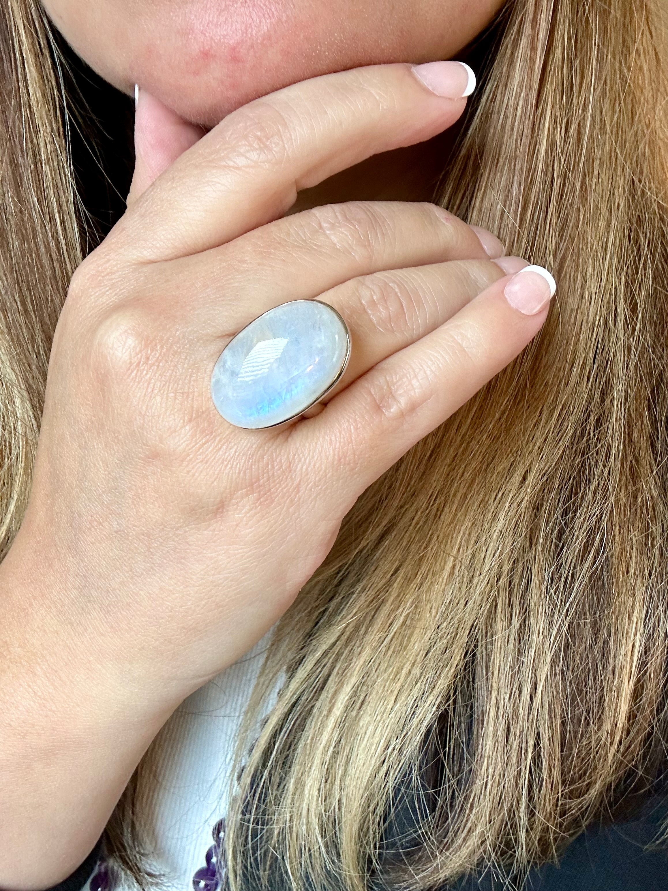 Moonstone Adjustable Silver Ring in Oval-mounded shape.