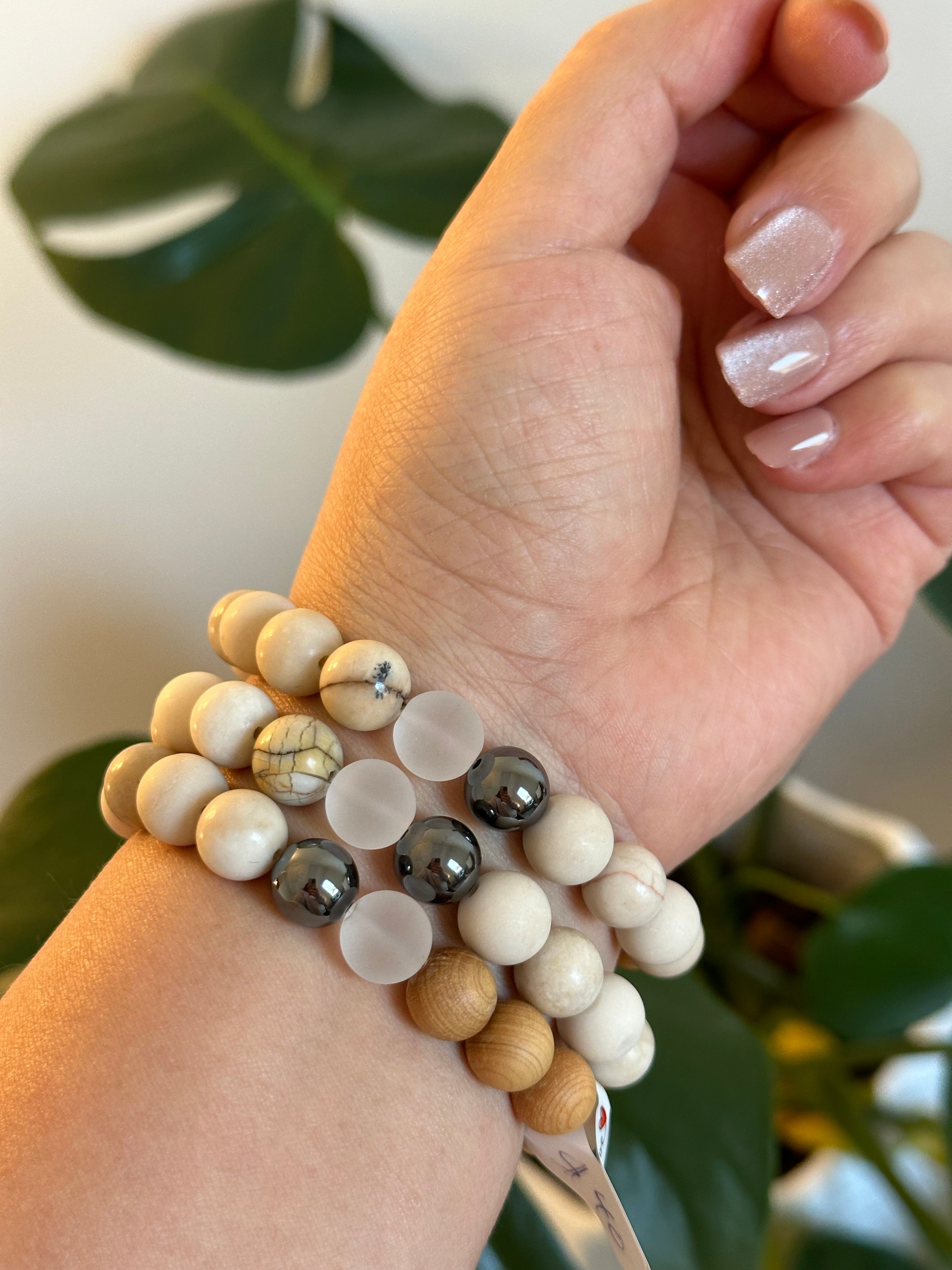 Ivory Jasper bracelets with dendritic accent, hematite, matte quartz and cypress wood beads.