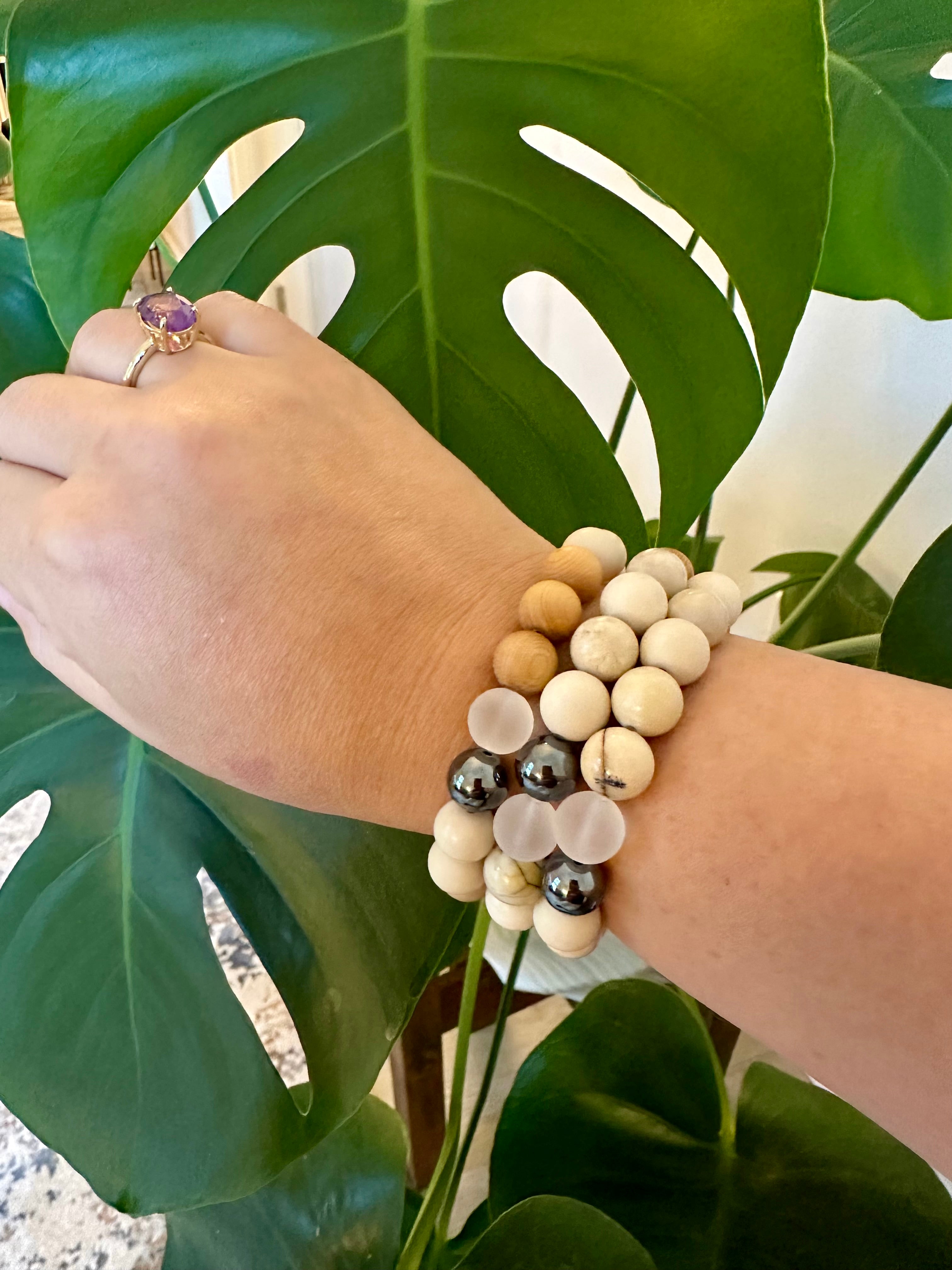 Ivory Jasper bracelets with dendritic accent, hematite, matte quartz and cypress wood beads.