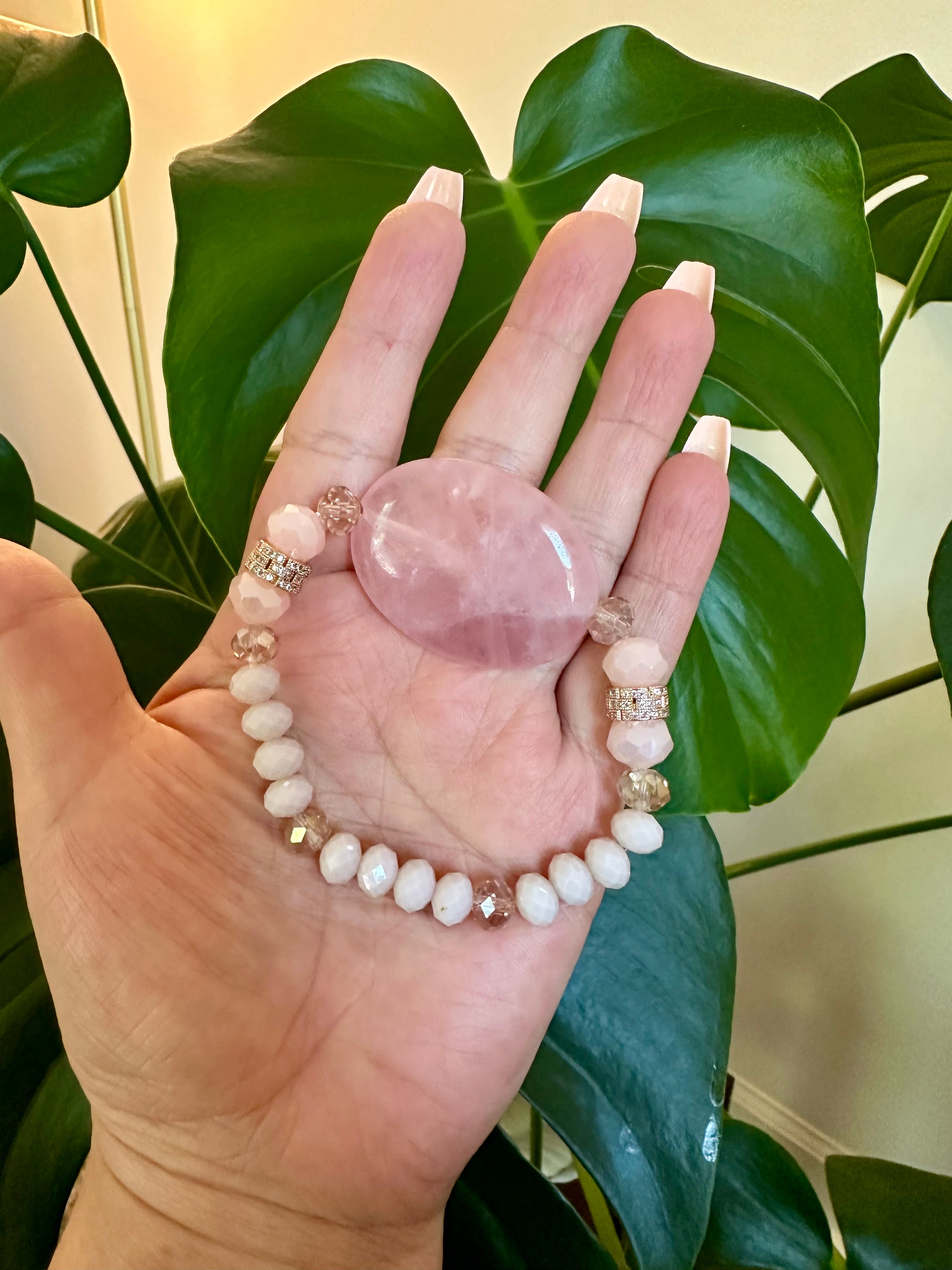 Rose quartz femine energy themed bracelet with large oblong Rose quartz gemstone.