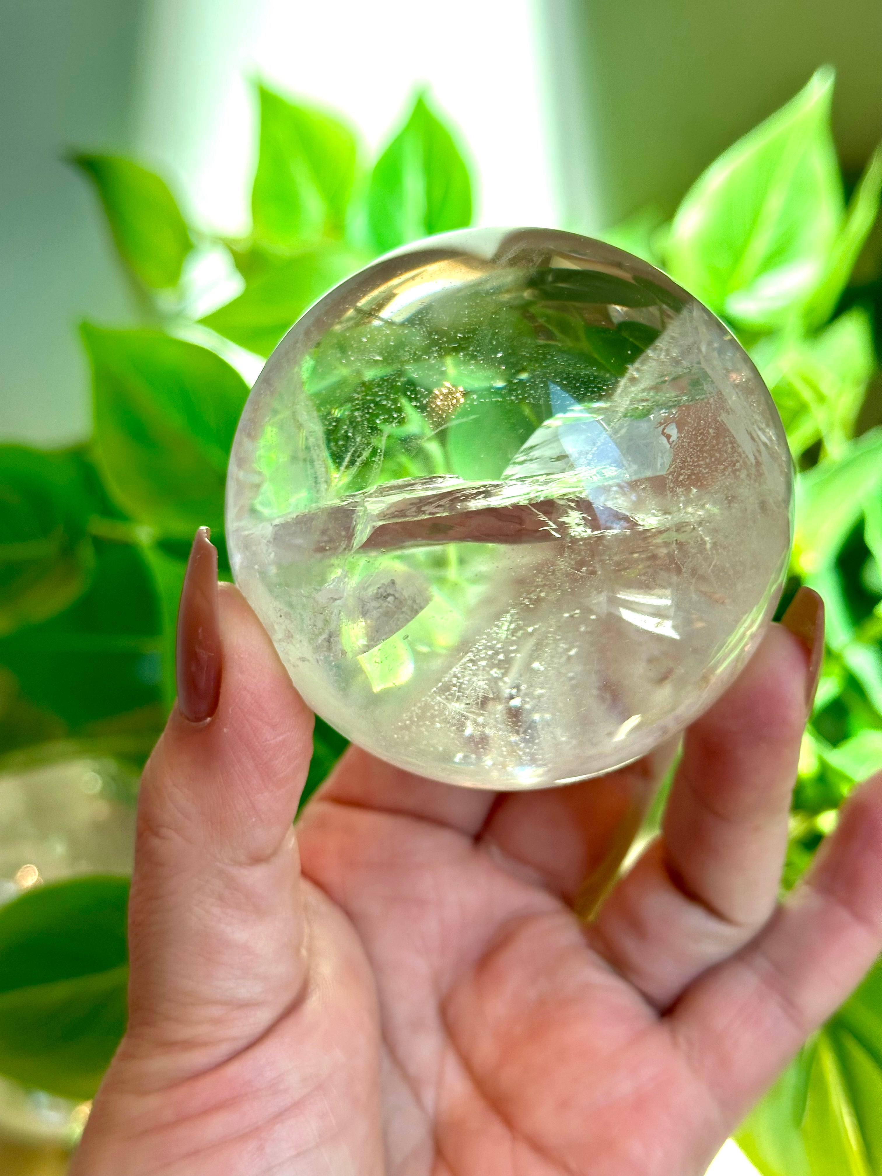 Beautiful Quartz Sphere with prominent Rainbows