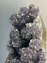 Stunning Black Galaxy Amethyst cluster from Paraguay. Cut base displays two ways.