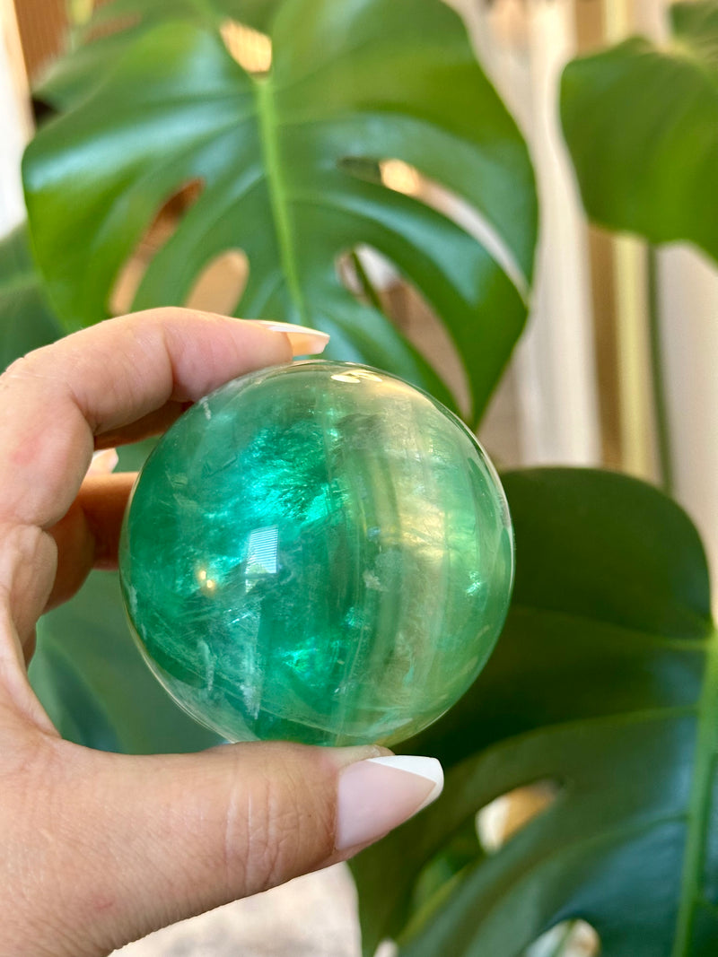 Gorgeous Emerald Green Fluorite Sphere. 65mm.