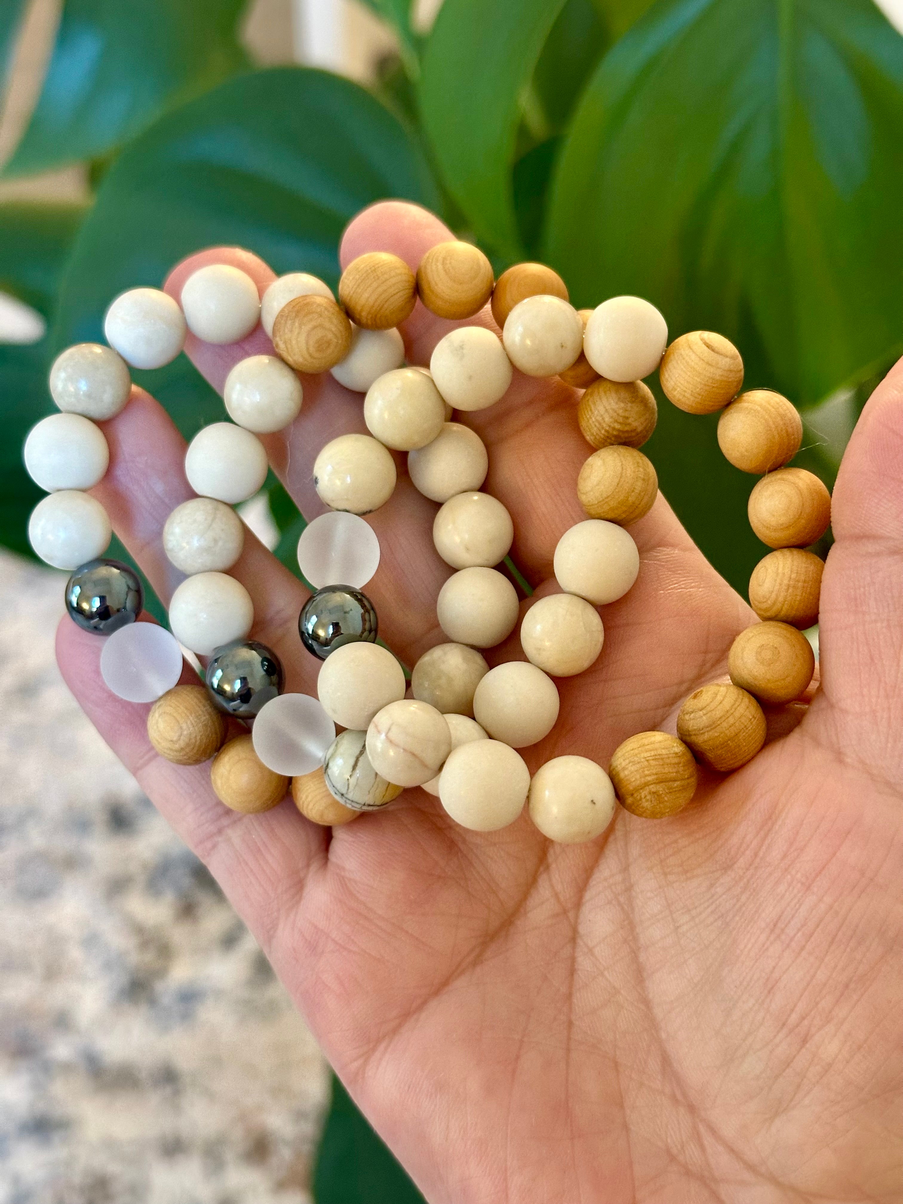 Ivory Jasper bracelets with dendritic accent, hematite, matte quartz and cypress wood beads.