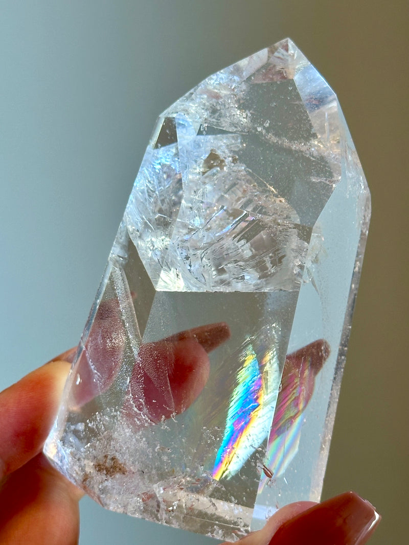 High Grade Quartz tower with Rare Rainbow Feather.