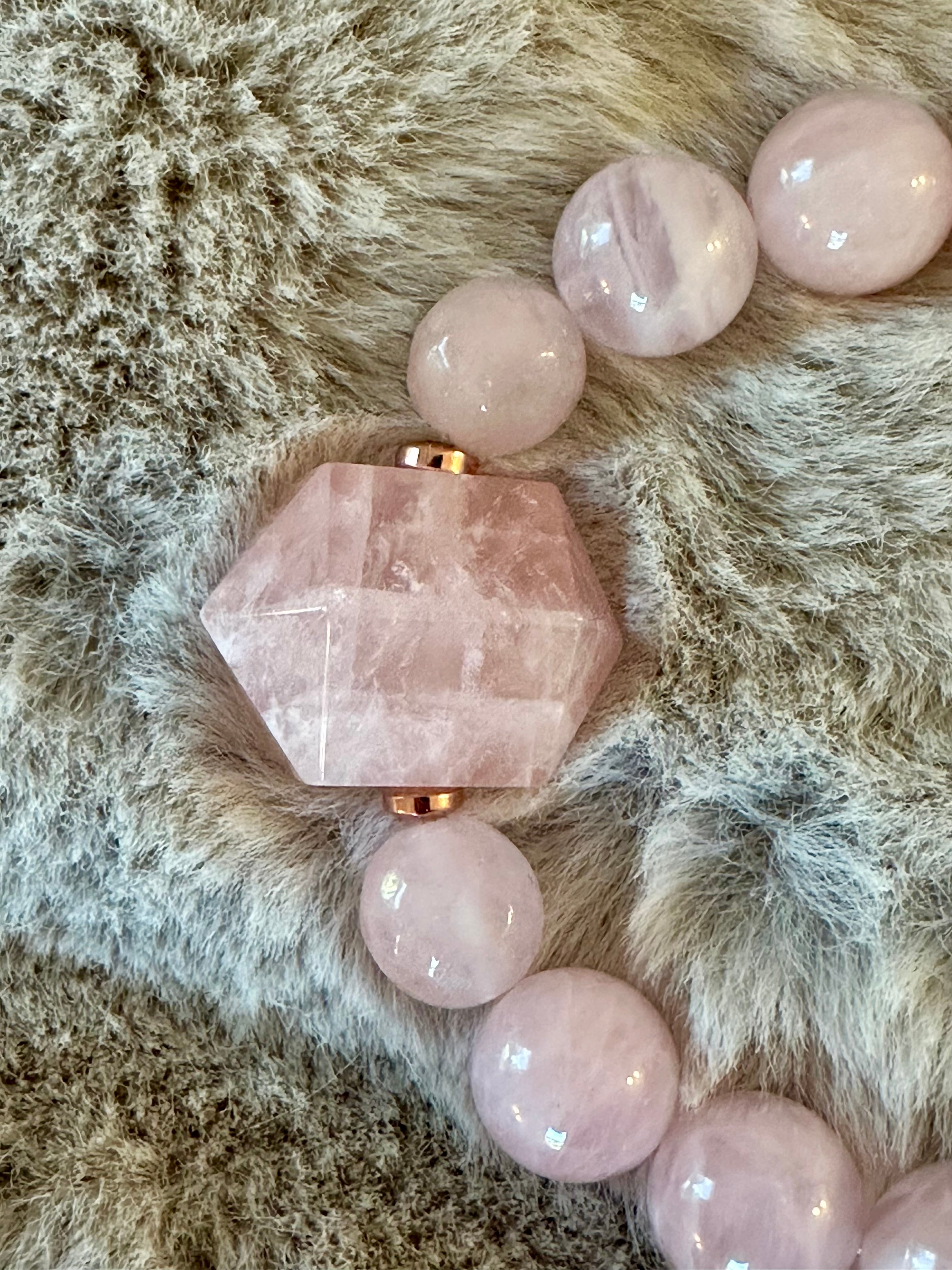 Sacred geometry inspired bracelet with Moroccan rose quartz beads. Genuine Rose quartz beaded bracelet.