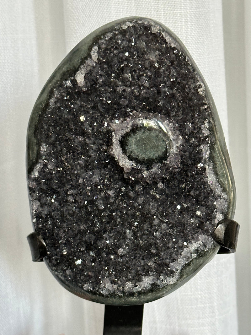 Black Galaxy Amethyst Geode with custom iron display from Uruguay.