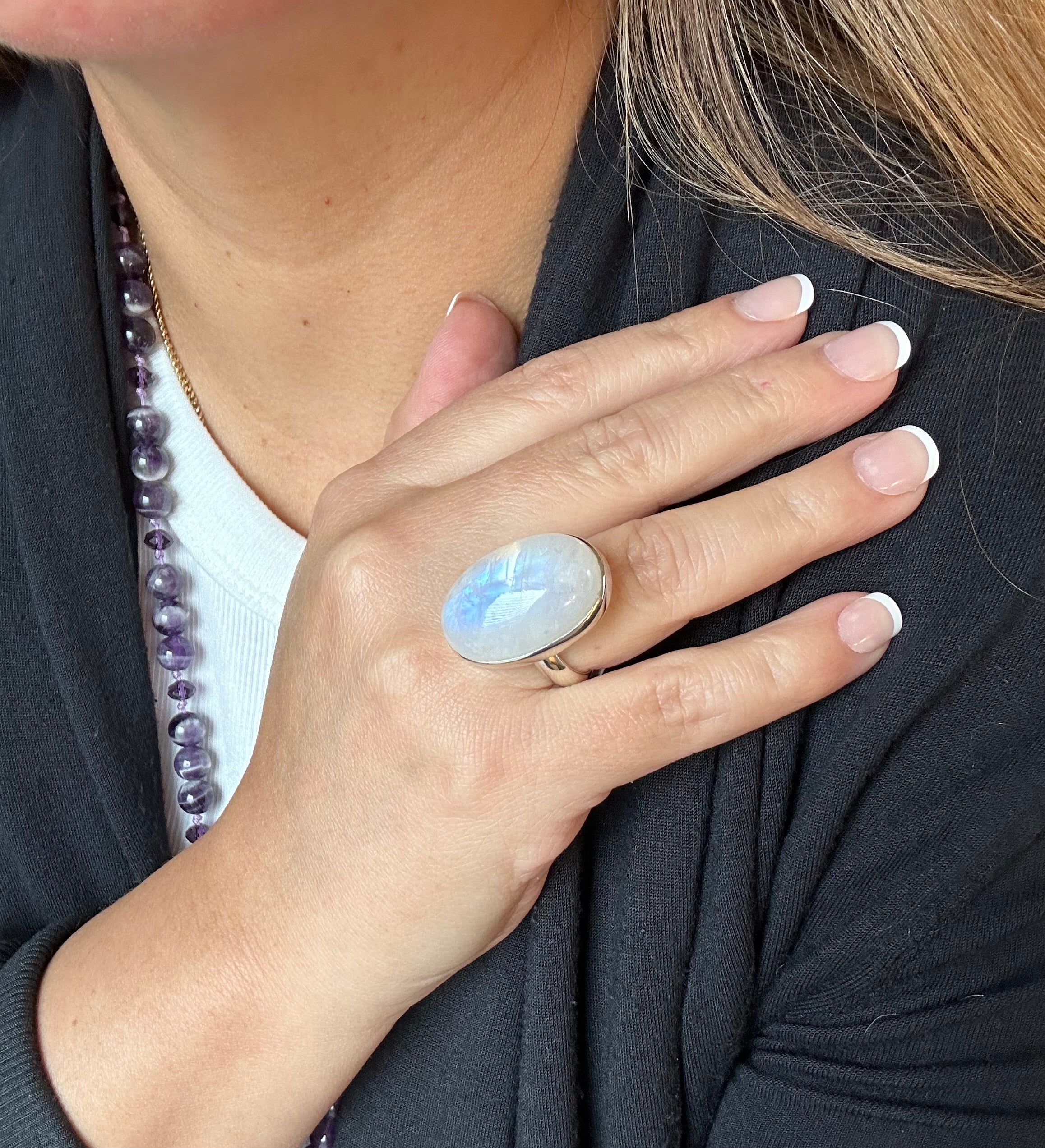 Moonstone Adjustable Silver Ring in Oval-mounded shape.