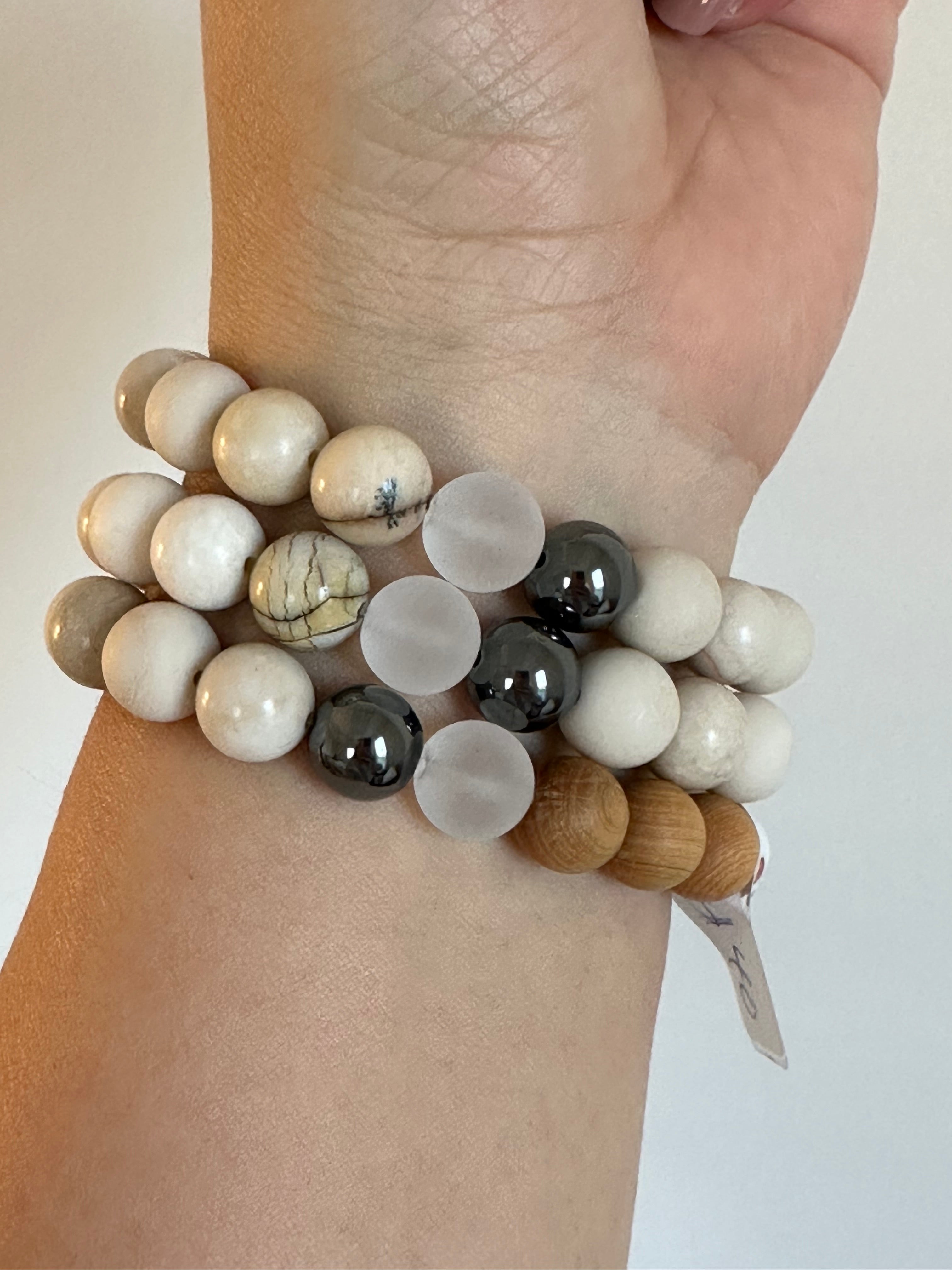 Ivory Jasper bracelets with dendritic accent, hematite, matte quartz and cypress wood beads.