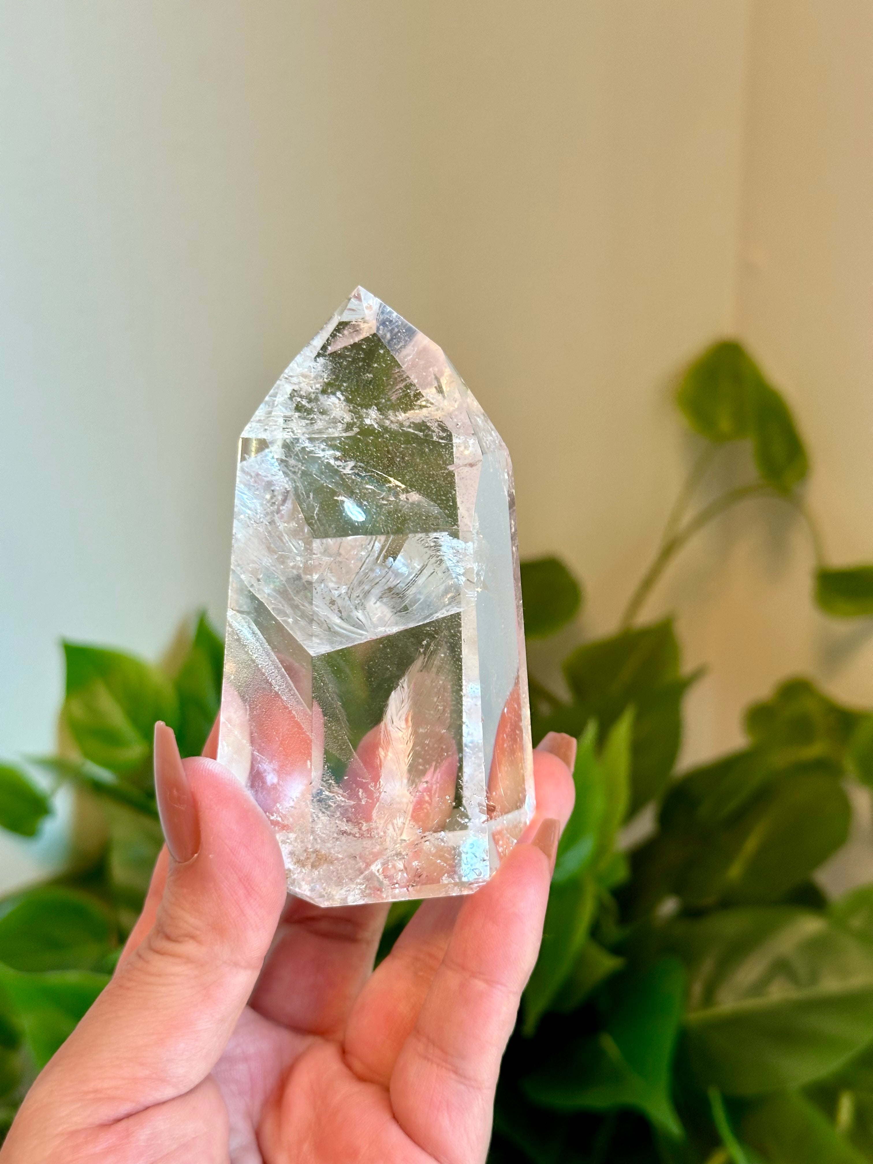 High Grade Quartz tower with Rare Rainbow Feather.