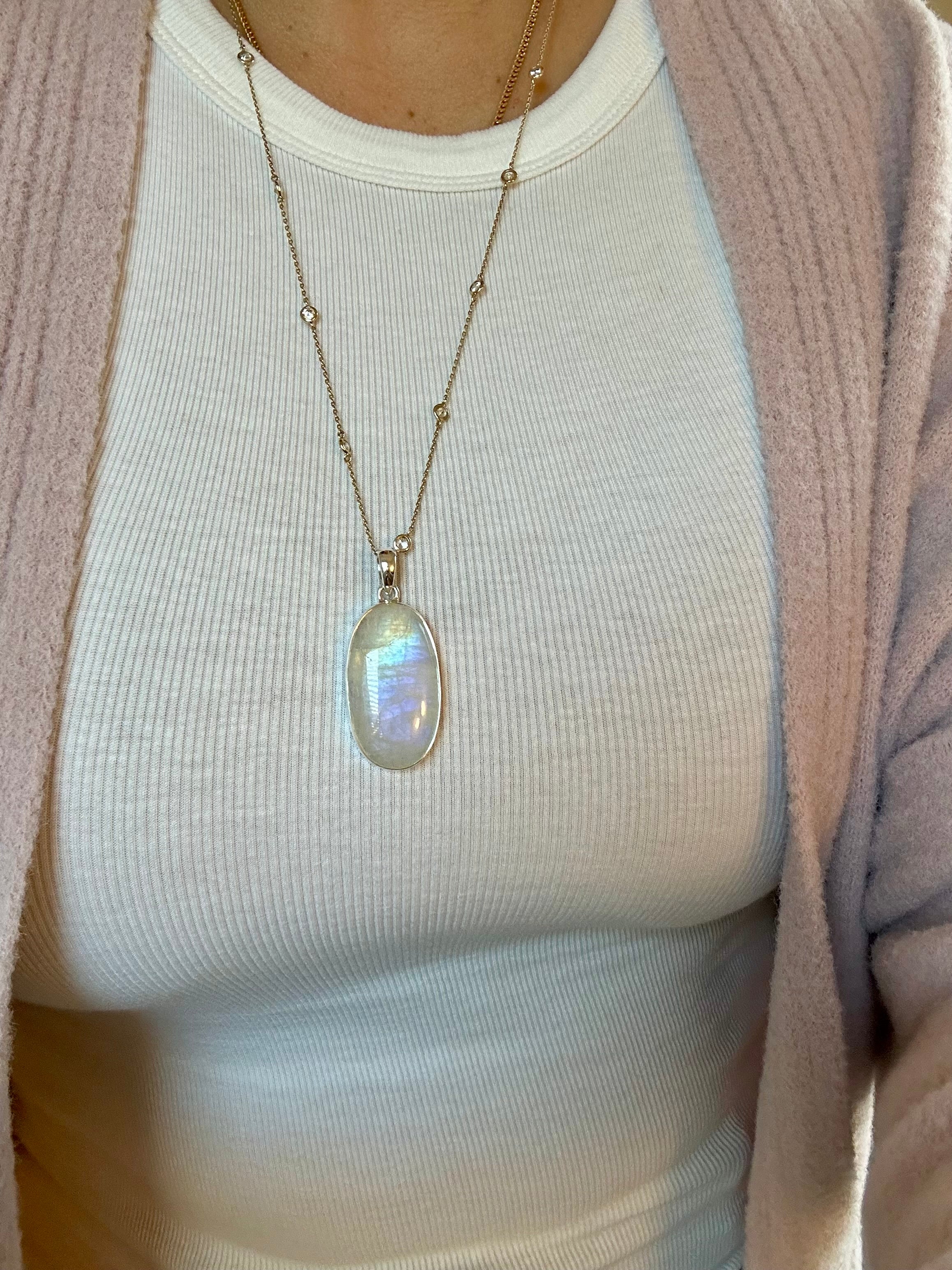 Oblong Moonstone Silver Pendant.