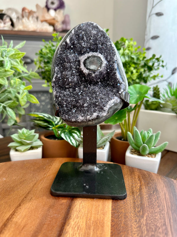 Black Galaxy Amethyst Geode with custom iron display from Uruguay.
