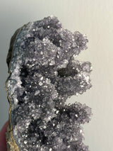 Stunning Black Galaxy Amethyst cluster from Paraguay. Cut base displays two ways.