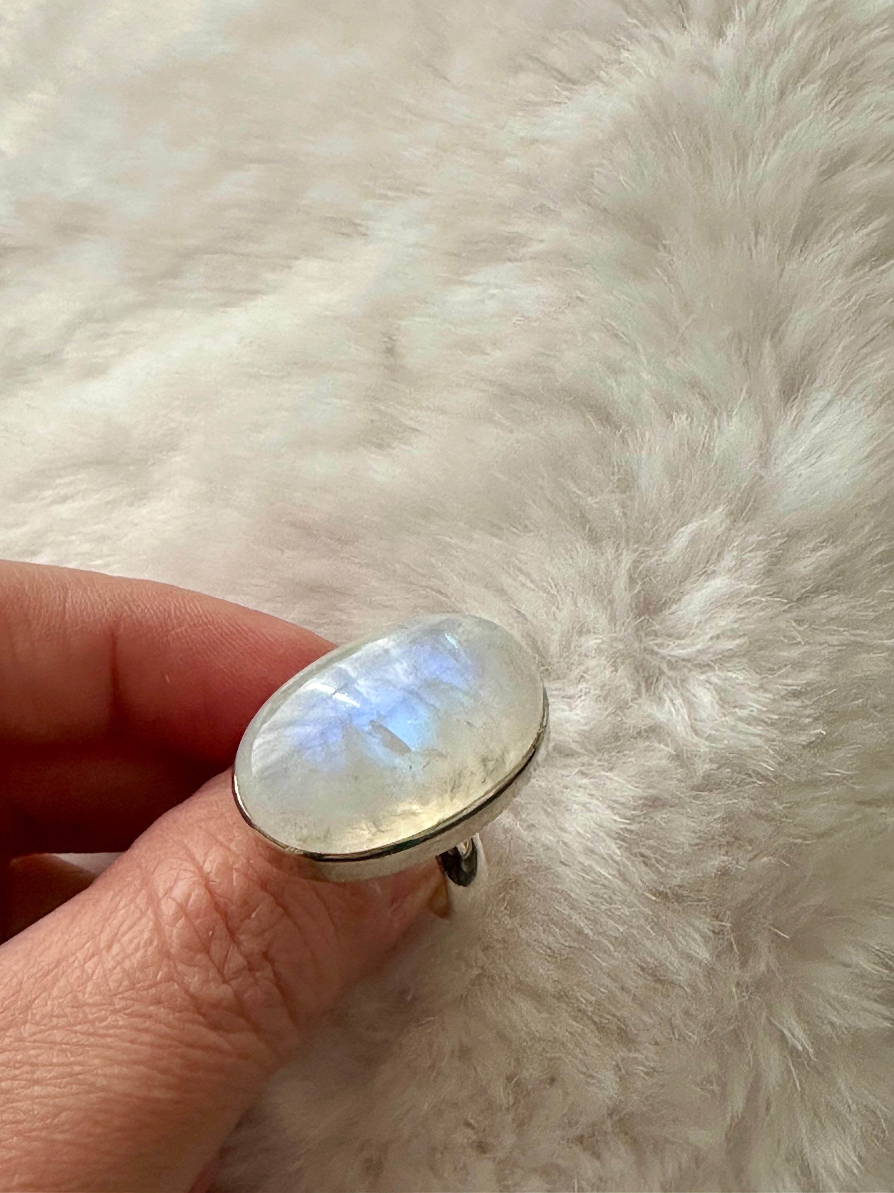 Moonstone Adjustable Silver Ring in Oval-mounded shape.