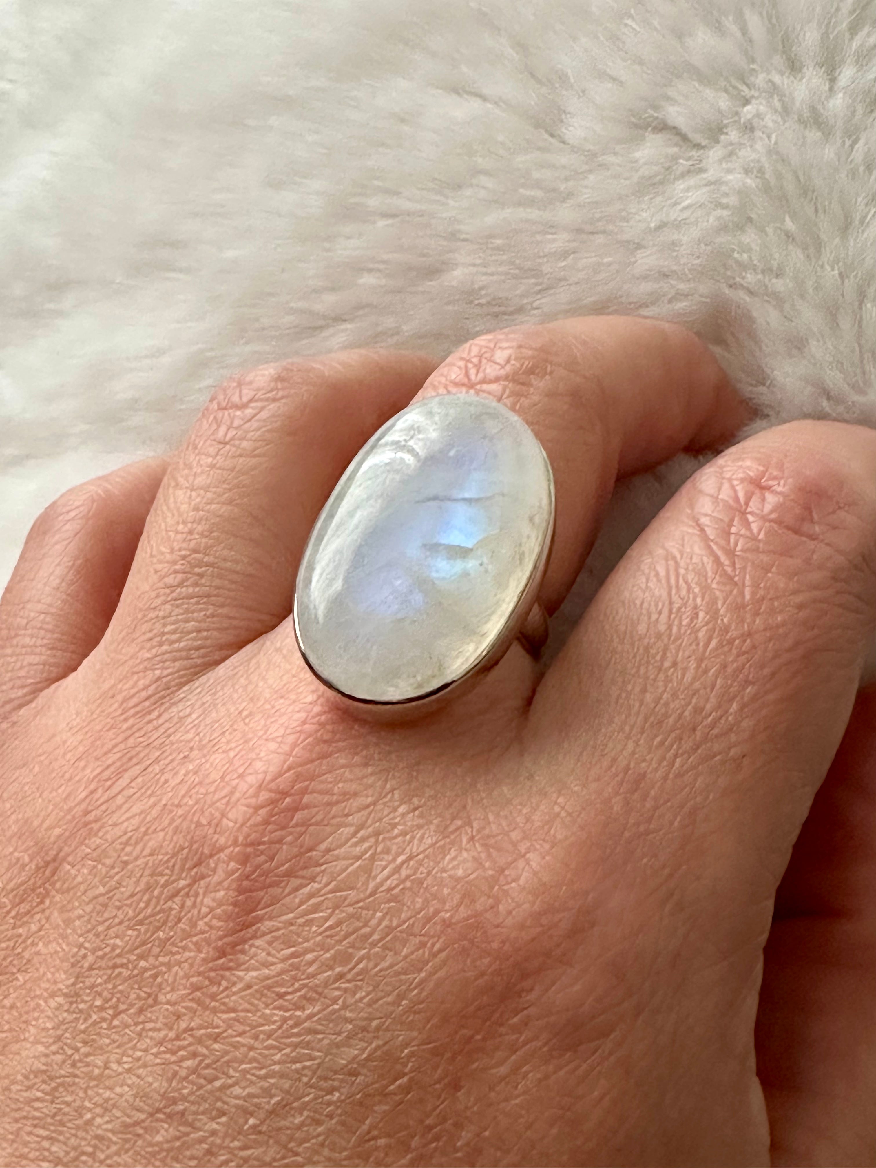 Moonstone Adjustable Silver Ring in Oval-mounded shape.