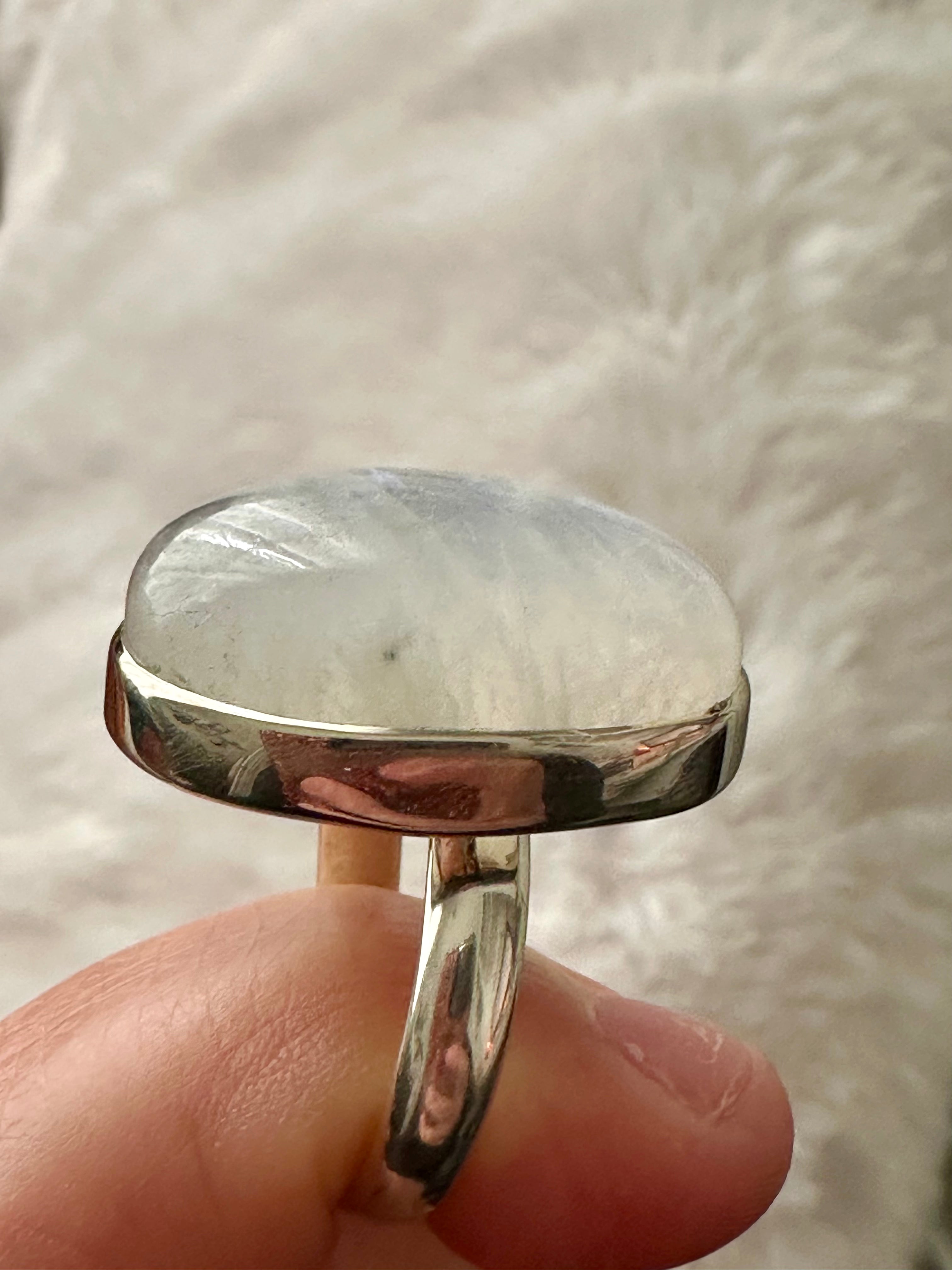 Moonstone Adjustable Silver Ring in Oval-mounded shape.