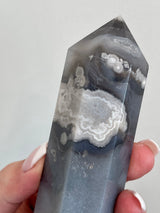 Black Flower Agate tower from Madagascar. Large Flower Agate tower with Druzy.