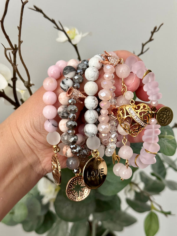 Stacked Crystal Beaded Bracelets in Pink and Grey tones