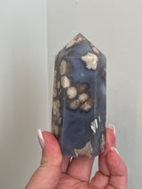 Black Flower Agate tower from Madagascar. Medium size tower full of Agate flowers.